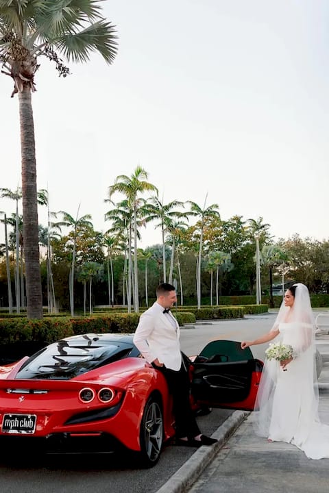 Couple booking luxury car near Vancouver hotel
